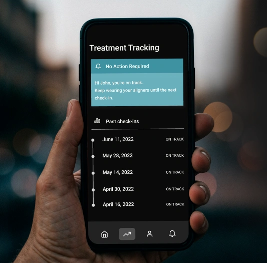 Orthodontic treatment tracking app showing patient progress and check-in history in Aurora, IL.