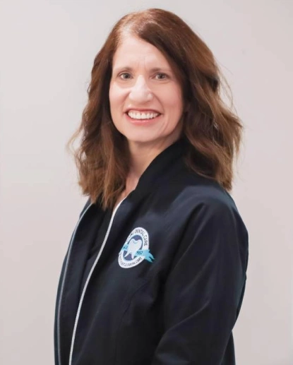 Nina, dental hygienist at Aurora dental office in Aurora, IL smiling.