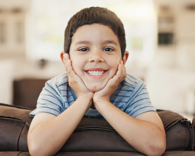 Happy young boy smiling after airway prevention treatment at Aurora, IL dental practice.