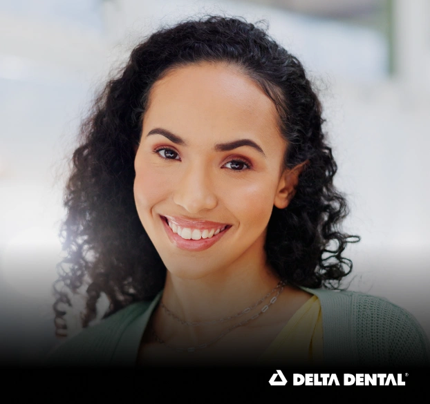 Smiling patient at Delta Dental affiliated practice in Aurora, Illinois.