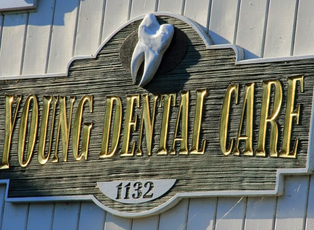 Young Dental Care logo.
