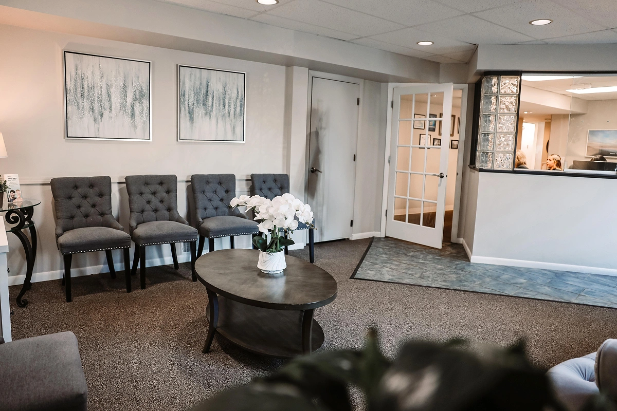 Welcoming waiting area at dental practice in Aurora, IL with comfortable seating.