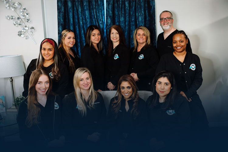 Dental team at Prairie Street Dental in Aurora, IL welcoming new patients.
