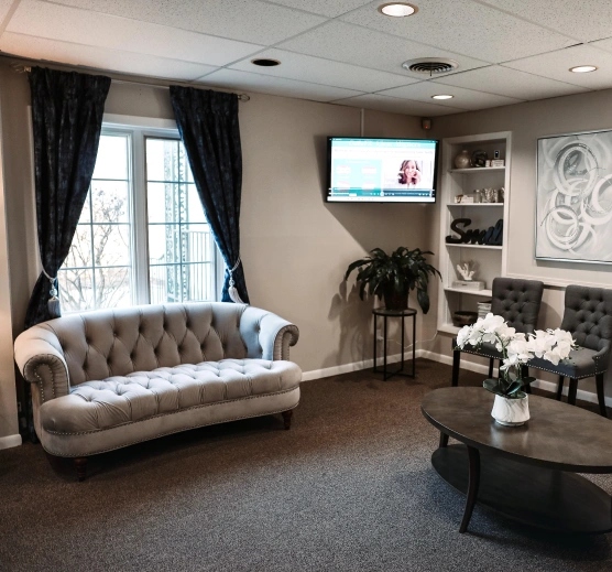 Modern waiting area at Young Dental Care in Aurora, IL featuring comfortable seating and welcoming decor.