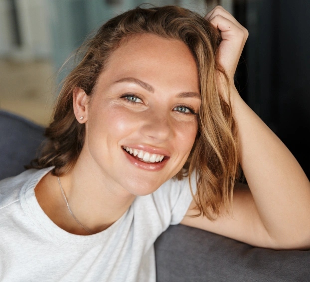 Patient smiling after cosmetic dentistry at Aurora dental practice in Aurora, Illinois.