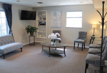 Welcoming reception and waiting area at dental practice in Aurora, IL.